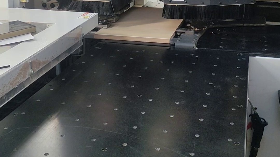 ENF, E0 and E1 Plywood: What the Formaldehyde Grades Actually Mean Cut board components being lifted from the machine table in a joinery workshop.