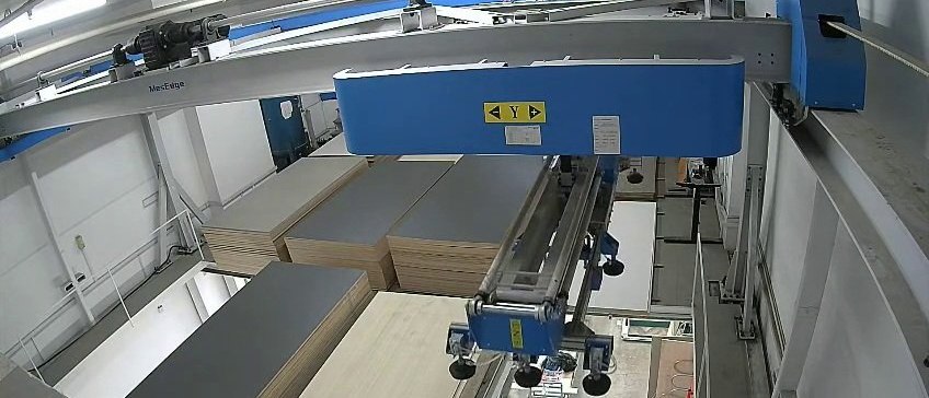 Specifying and Verifying Low-Formaldehyde Plywood on Singapore Projects Sheet material held flat in stacks in an automated panel store, ready to be drawn down to the cutting line.