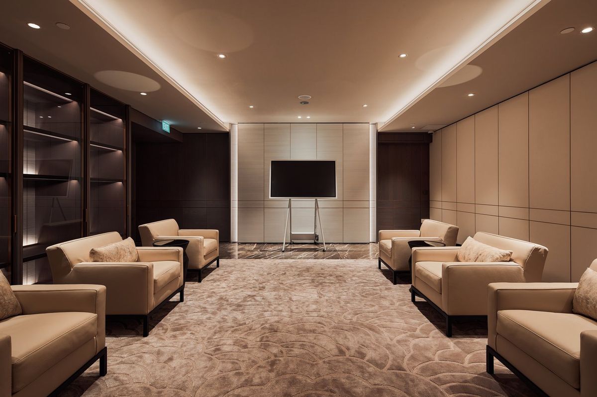 Completed luxury lounge with joinery, lighting and furniture installed to the approved interior layout