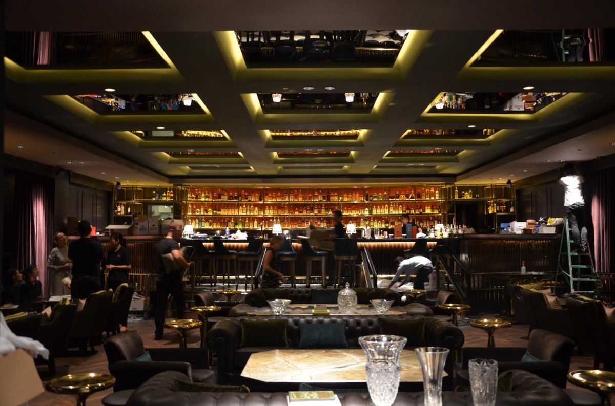 Bespoke bar joinery, displays and lighting installed in a luxury hospitality interior
