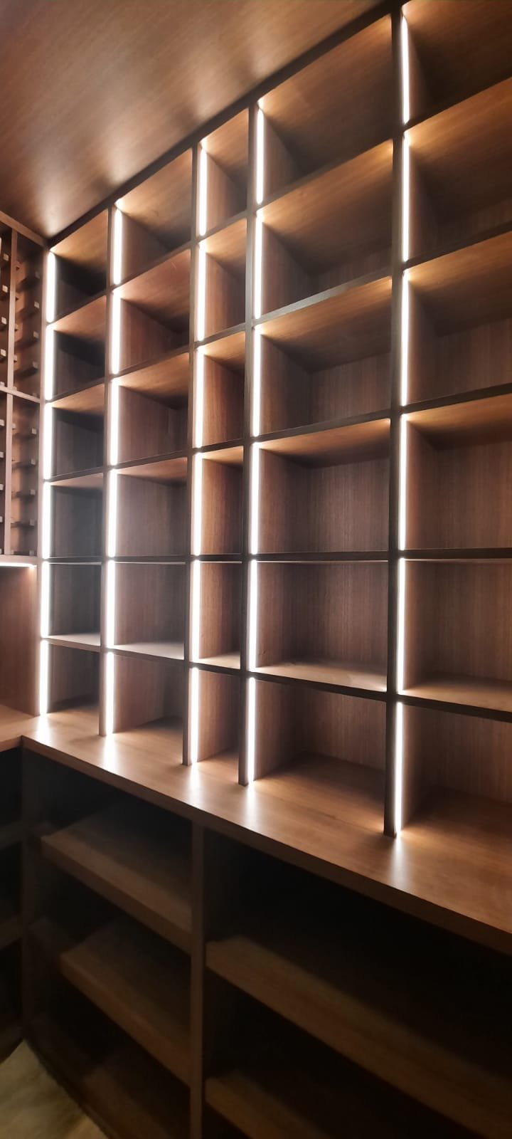 Integrated Glass, Aluminium & Metal Components in Imported Furniture: Why Luxury FF&E Needs Multi-Trade Installation Coordination in Singapore glass and metal wine display installation singapore