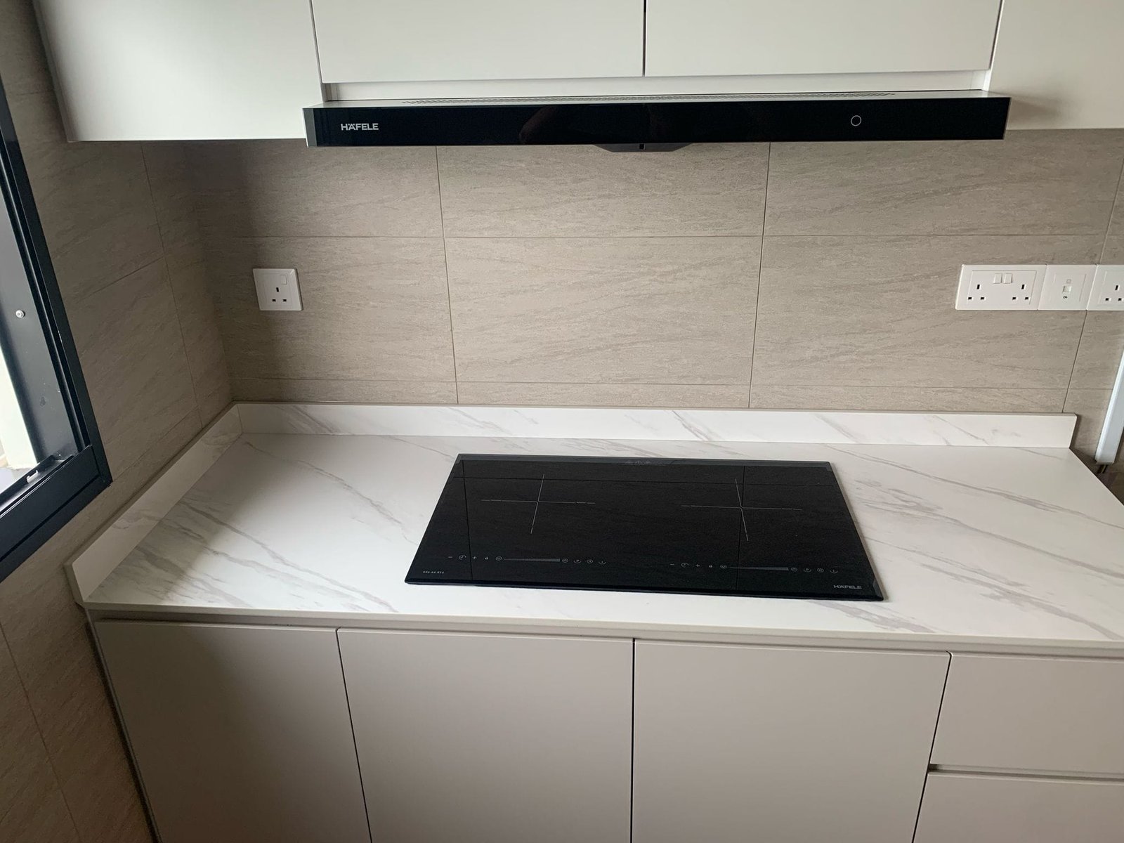 Wall Fixing & Structural Support for Imported Furniture in Singapore: Why a Beautiful Cabinet Still Needs the Right Substrate luxury kitchen cabinet and tall unit anchoring in singapore