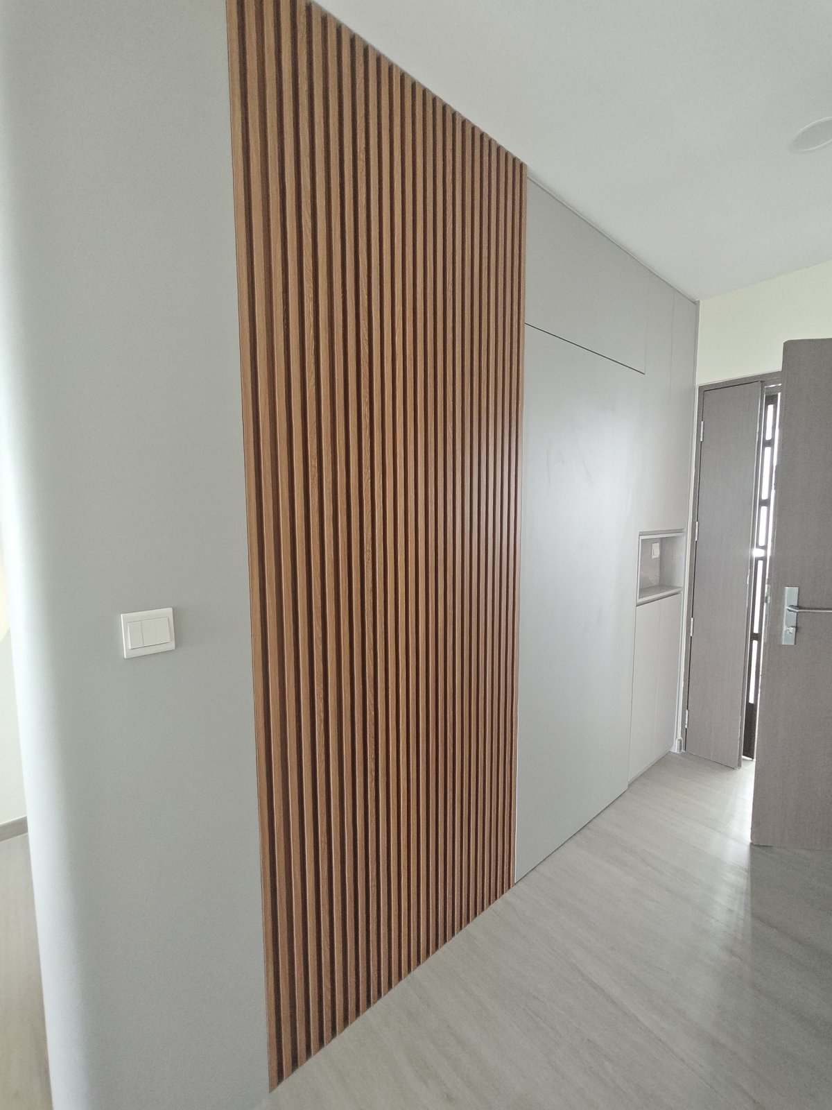 Defect Rectification & FF&E Snagging in Singapore: From Installation Punch List to Final Handover timber slat feature wall finish inspection singapore