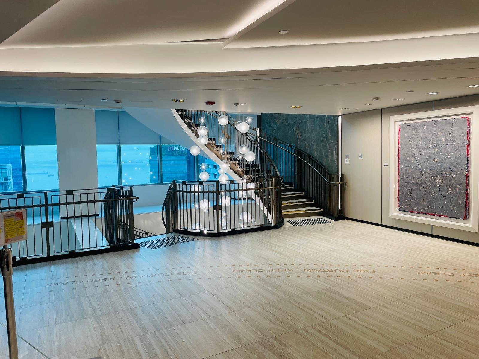 Building lobby with a feature staircase during alteration and addition works