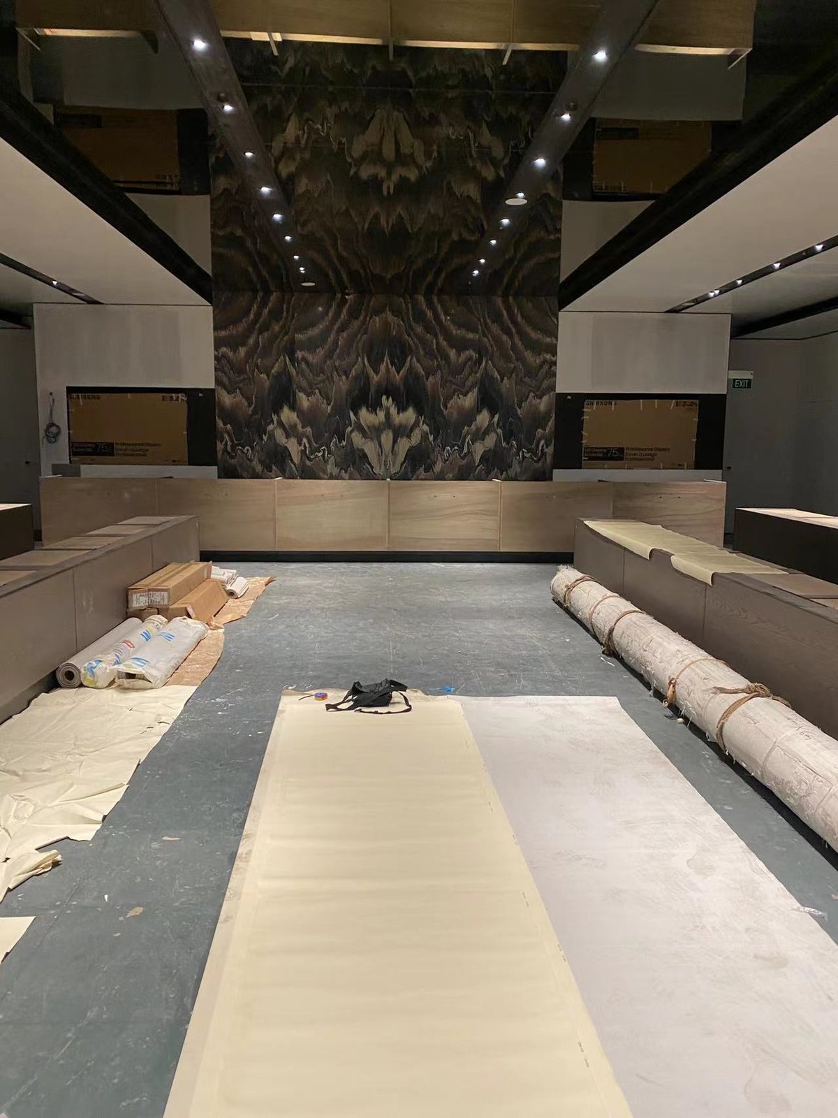 Stone Dry-Lay, Vein Matching & Final Templating for Imported Furniture in Singapore bookmatched stone lobby installation singapore