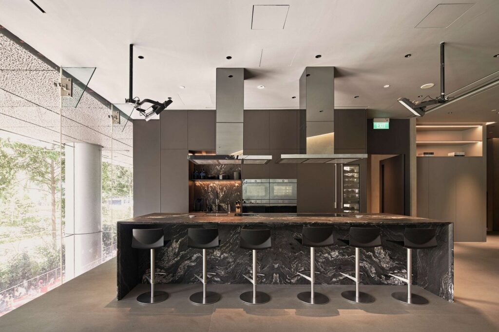 Rectifying FF&E in a Hotel That Has Already Opened: Room Nights, Housekeeping Access and the Remove-and-Return Cycle completed bar counter stone glazing singapore