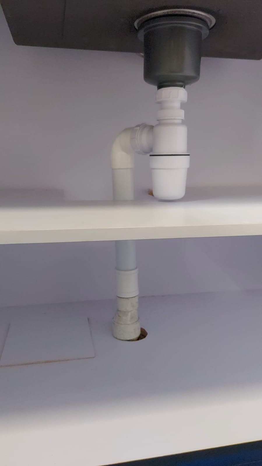Imported Furniture Interface Coordination in Singapore: Who Is Responsible for Walls, M&E, Stone, Glass and Appliances? concealed plumbing service access cabinet singapore
