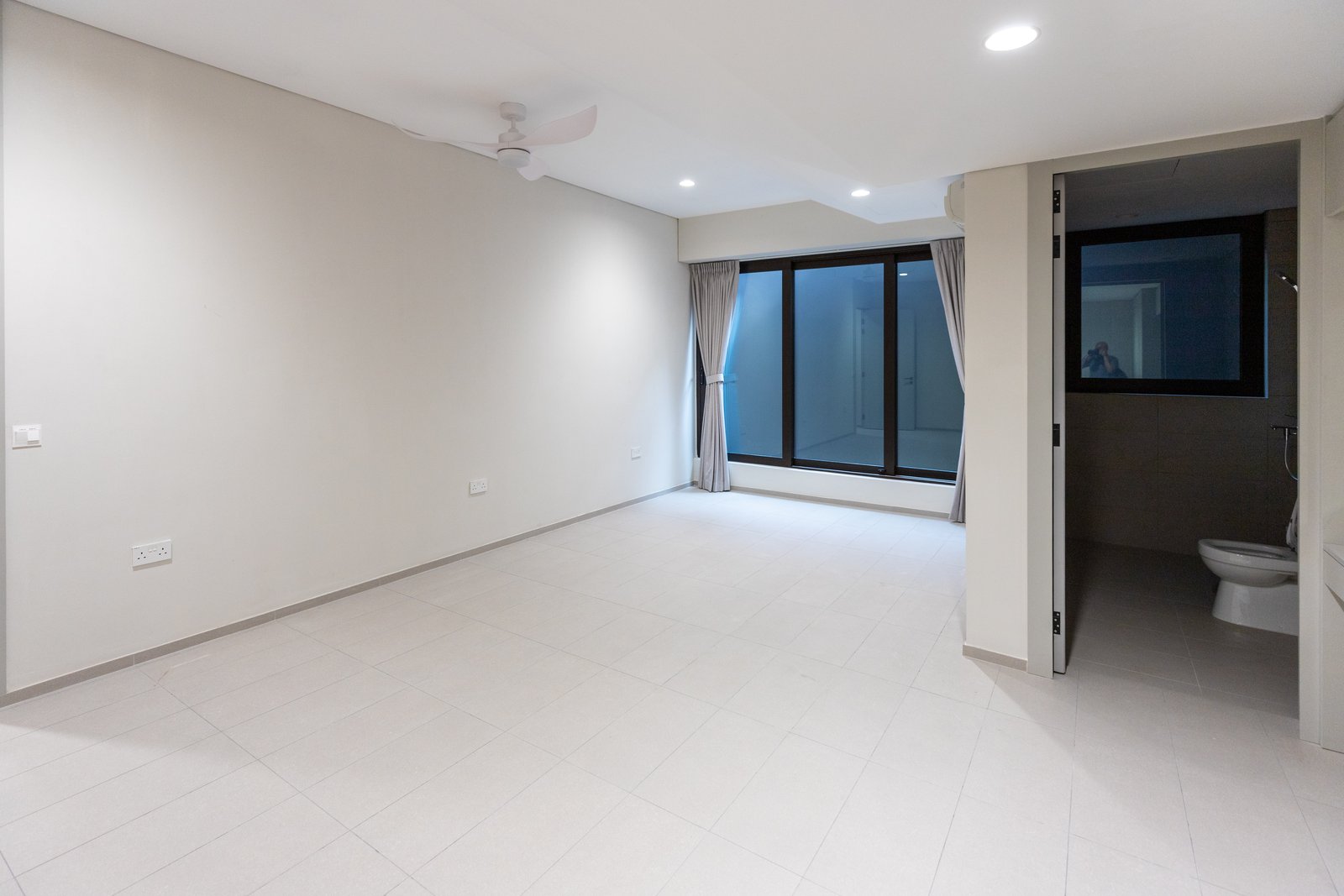 Room-by-Room FF&E Kitting & Staged Delivery in Singapore: Getting Imported Furniture to the Right Unit at the Right Time empty unit ready for ffe delivery singapore