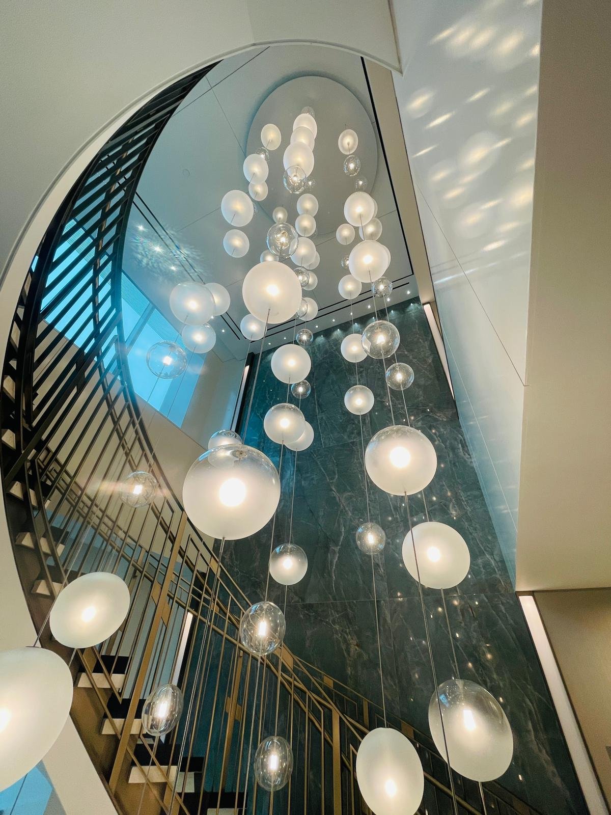 High-Level & Oversized Imported Furniture Installation in Singapore: Access, Lifting, Temporary Support and Safe Fixing high level feature stair lighting installation singapore
