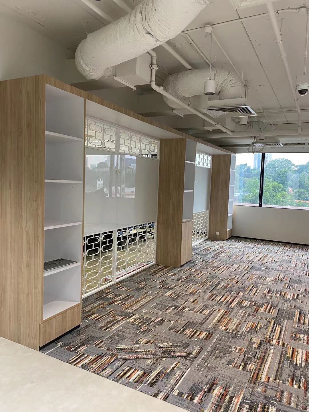 Builder's Works and Fit-Out Execution in Singapore: The Site Scope an Overseas Contractor Cannot Ship joinery run installed during office fit out in progress singapore
