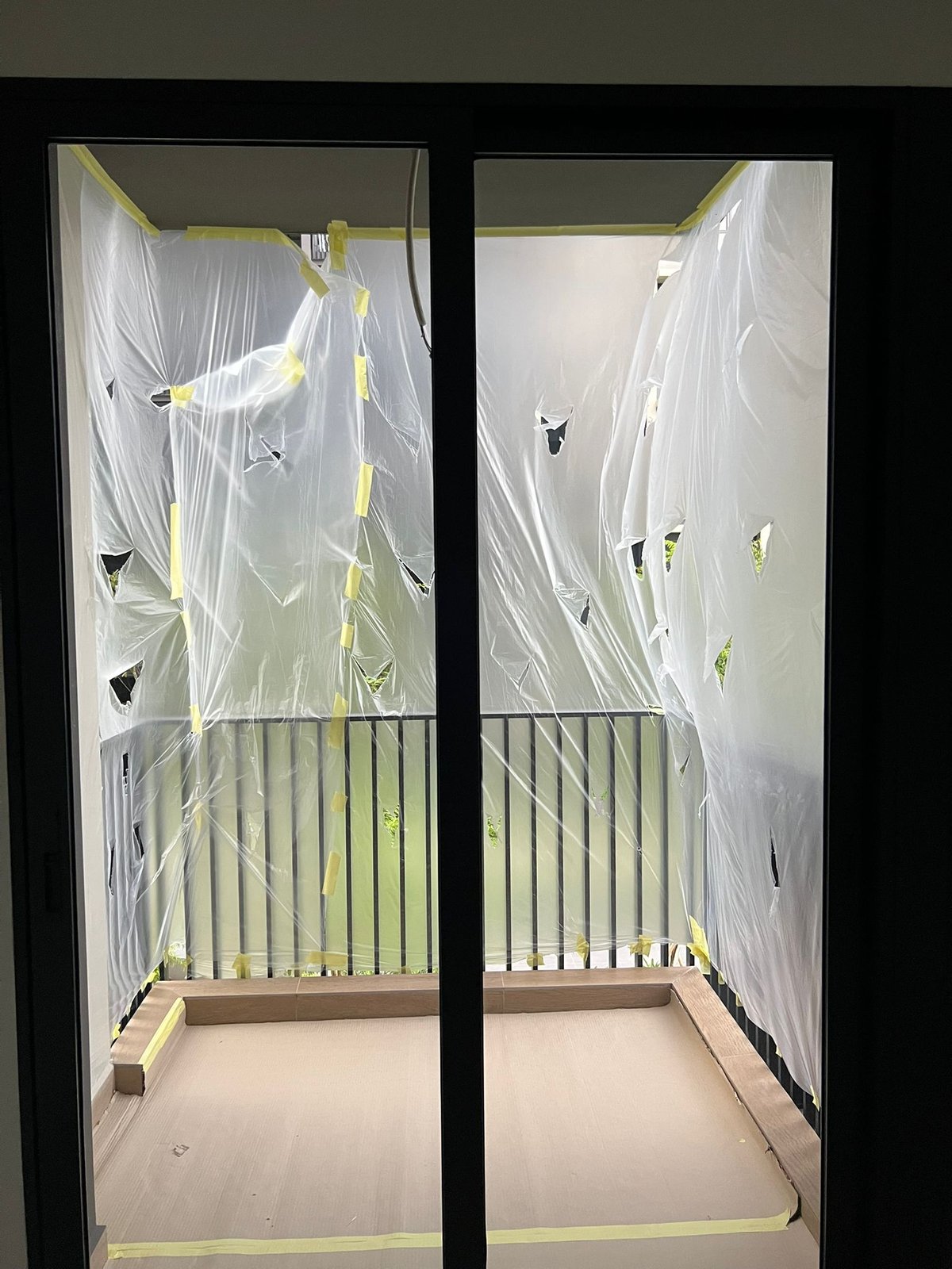 Imported Furniture Protection After Installation in Singapore: Preventing Damage Before FF&E Handover protected glass door opening furniture installation singapore