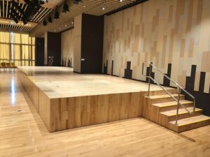 Commercial Renovation Cost in Singapore: Where Does the Money Actually Go? Rongda Timber Platform Feature Stair Interior Singapore 300x225